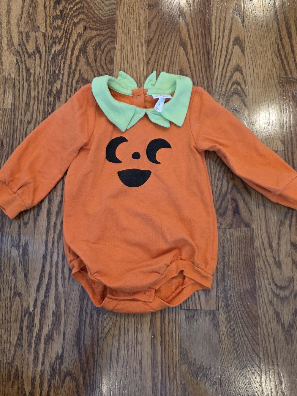 Cat & Jack Orange Pumpkin Face One-Piece Bodysuit with Green Collar